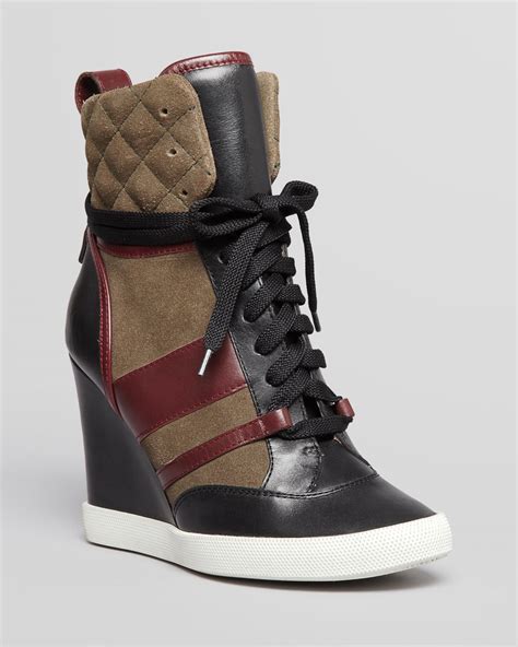 designer high top wedge sneakers.